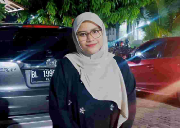 Lampu Merah dan Pengemis Bekostum Badut